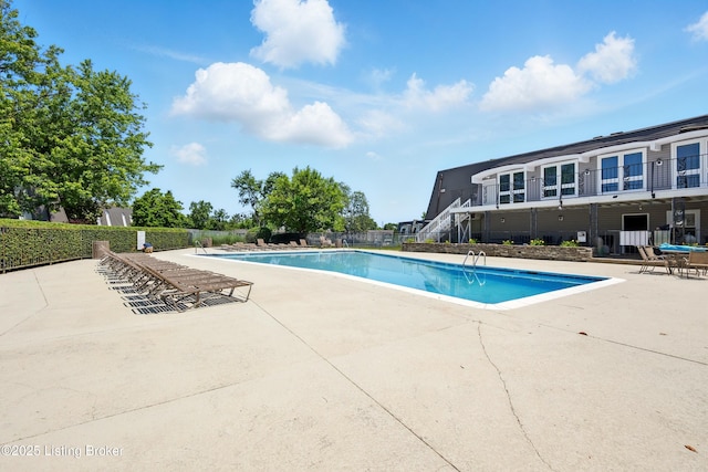 111 La Fontenay Ct, Louisville, KY 40223 - community pool featuring a patio and stairway