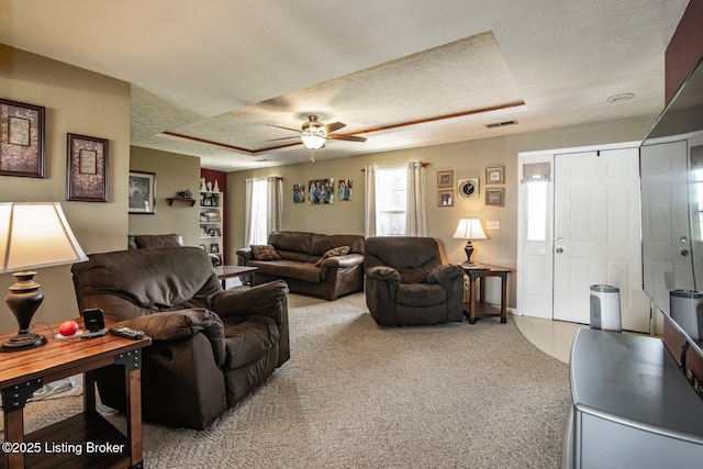 2923 High Plains Rd, Vine Grove, KY 40175 - living area featuring a textured ceiling, light carpet, and ceiling fan