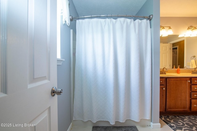 2923 High Plains Rd, Vine Grove, KY 40175 - full bathroom with double vanity and baseboards