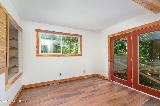 1465 Swope Rd, Owenton, KY 40359 - spare room with healthy amount of natural light and wood finished floors