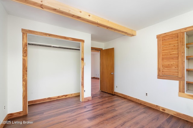 1465 Swope Rd, Owenton, KY 40359 - unfurnished bedroom with wood finished floors, a closet, and beam ceiling