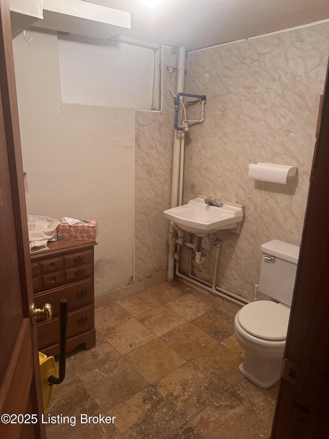 126 Taylorsville Rd, Bloomfield, KY 40008 - bathroom with stone tile floors and a sink