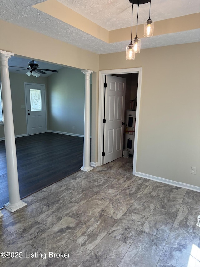106 Clay Ct, Bardstown, KY 40004 - unfurnished room featuring decorative columns, a textured ceiling, and ceiling fan