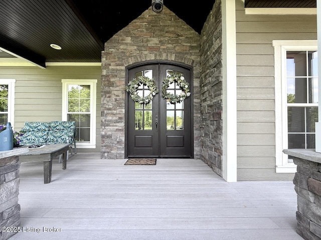 3637 Mount Washington Rd, Taylorsville, KY 40071 - entrance to property with french doors, stone siding, and a security system