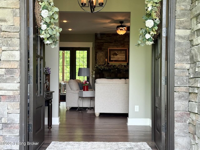 3637 Mount Washington Rd, Taylorsville, KY 40071 - entryway featuring dark wood-type flooring, ceiling fan, and a chandelier