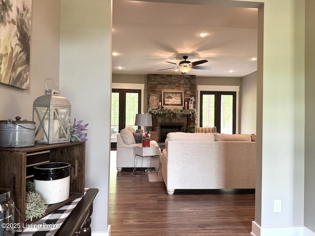 3637 Mount Washington Rd, Taylorsville, KY 40071 - living room featuring dark wood-type flooring, ceiling fan, a stone fireplace, and recessed lighting
