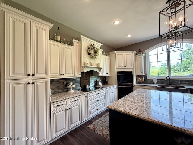 3637 Mount Washington Rd, Taylorsville, KY 40071 - kitchen featuring black appliances, dark wood-style flooring, backsplash, light stone countertops, and recessed lighting