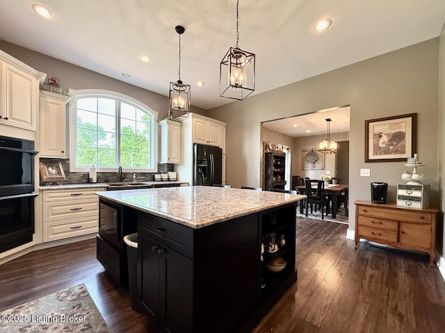 3637 Mount Washington Rd, Taylorsville, KY 40071 - kitchen featuring black appliances, dark cabinetry, a chandelier, dark wood-style flooring, and recessed lighting