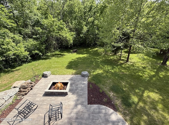 3637 Mount Washington Rd, Taylorsville, KY 40071 - view of green lawn featuring a fire pit and a patio