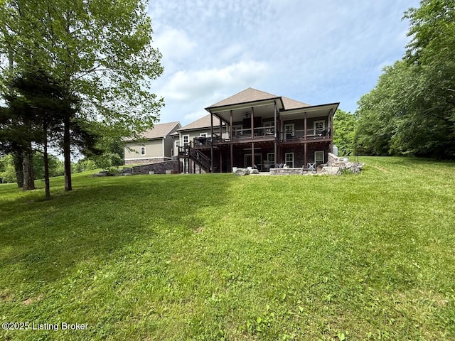 3637 Mount Washington Rd, Taylorsville, KY 40071 - rear view of house with stairway, a lawn, and a wooden deck