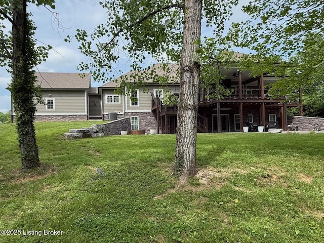 3637 Mount Washington Rd, Taylorsville, KY 40071 - back of house with a lawn, ceiling fan, a deck, and stone siding