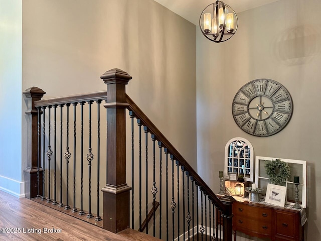 3637 Mount Washington Rd, Taylorsville, KY 40071 - stairway featuring a chandelier and wood finished floors