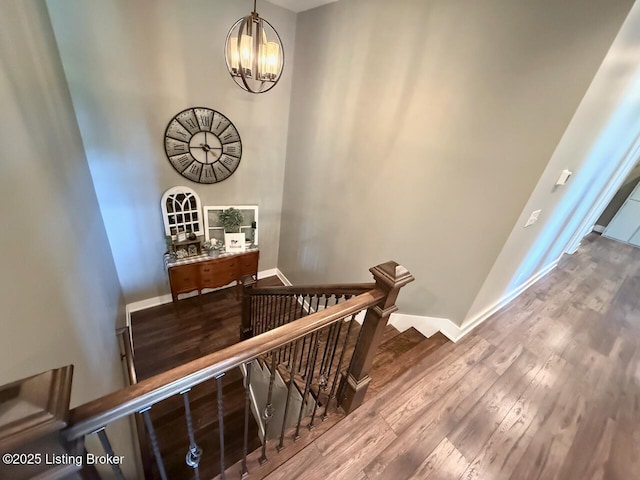 3637 Mount Washington Rd, Taylorsville, KY 40071 - staircase featuring wood finished floors and a chandelier