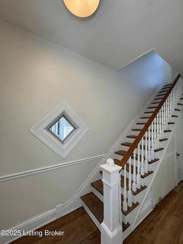 1403 S Brook St, Louisville, KY 40208 - stairs featuring wood finished floors and a skylight