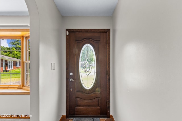 7502 Sam Ct, Louisville, KY 40214 - foyer with arched walkways and baseboards