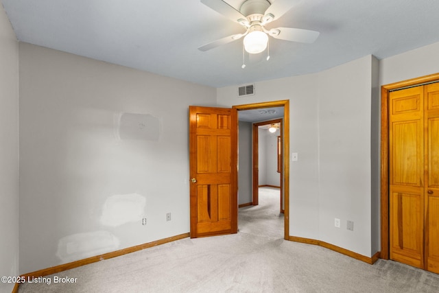 7502 Sam Ct, Louisville, KY 40214 - unfurnished bedroom featuring light carpet, ceiling fan, and a closet