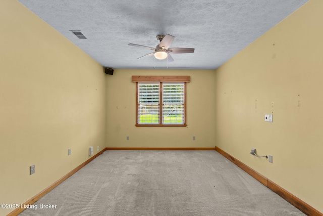 7502 Sam Ct, Louisville, KY 40214 - spare room featuring ceiling fan, light carpet, and a textured ceiling