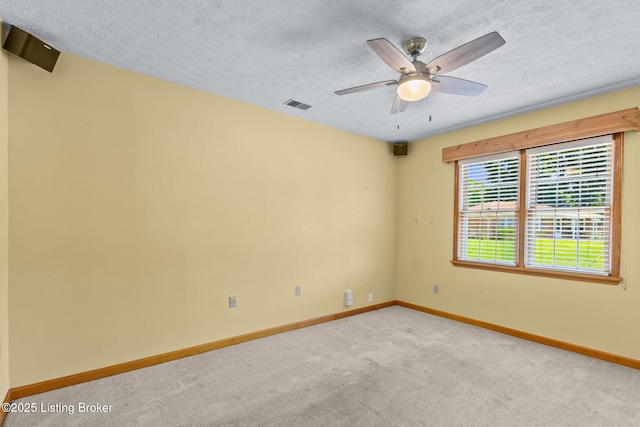 7502 Sam Ct, Louisville, KY 40214 - empty room with light colored carpet, a textured ceiling, and ceiling fan