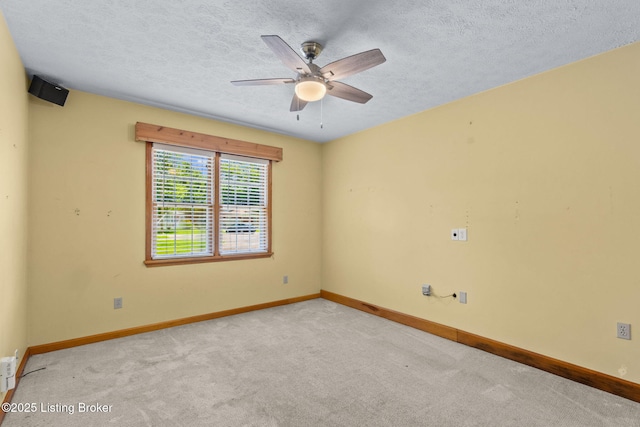 7502 Sam Ct, Louisville, KY 40214 - spare room with a ceiling fan, carpet floors, and a textured ceiling