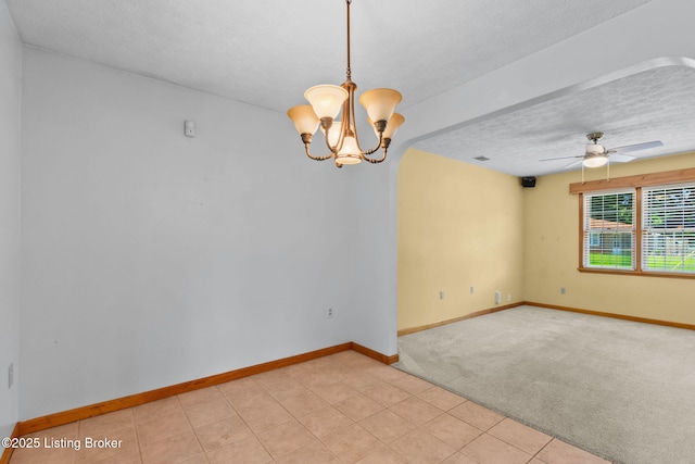 7502 Sam Ct, Louisville, KY 40214 - empty room with a ceiling fan, a chandelier, a textured ceiling, light carpet, and light tile patterned floors