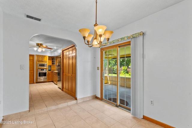 7502 Sam Ct, Louisville, KY 40214 - unfurnished dining area with arched walkways, a chandelier, light tile patterned floors, a ceiling fan, and a textured ceiling