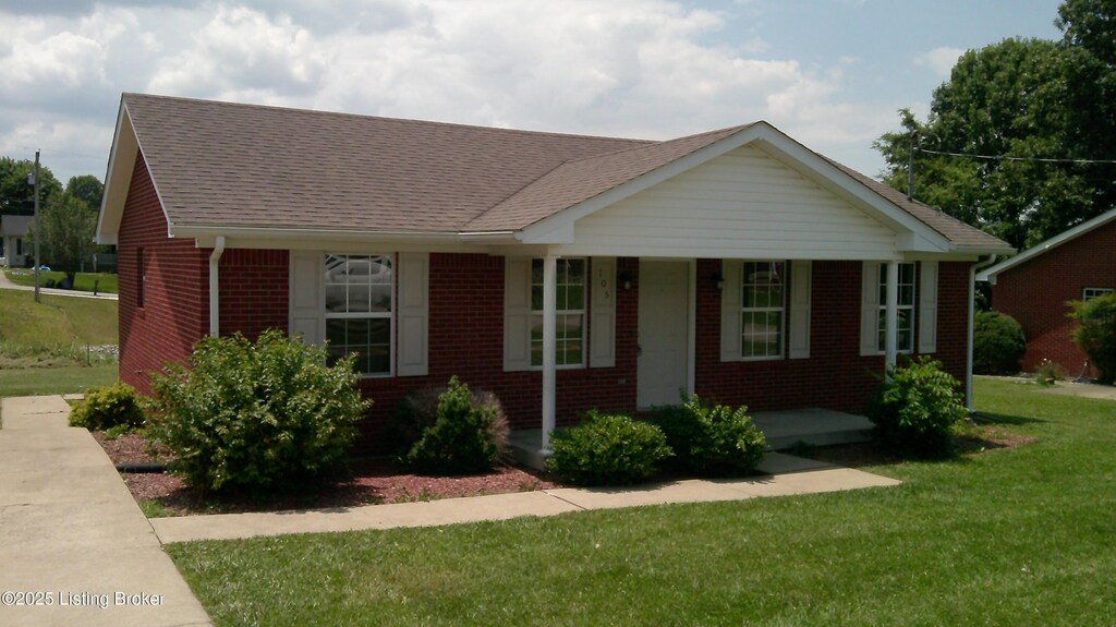 105 Foster Ct, Bardstown, KY 40004 - view of front facade with brick siding, a porch, a front lawn, and a shingled roof