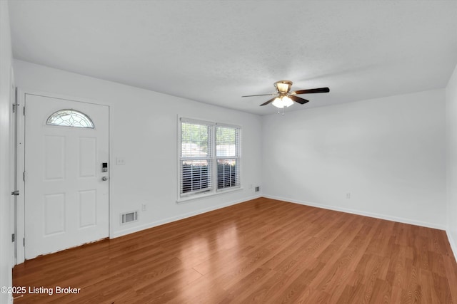 8313 Daverman Dr, Louisville, KY 40228 - entrance foyer with a ceiling fan and light wood finished floors