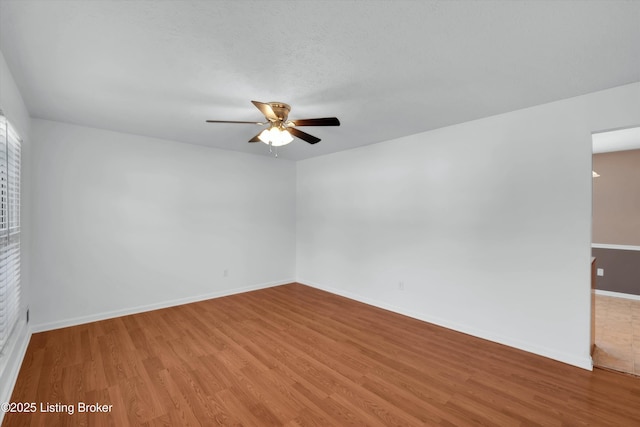 8313 Daverman Dr, Louisville, KY 40228 - spare room featuring ceiling fan and light wood-type flooring