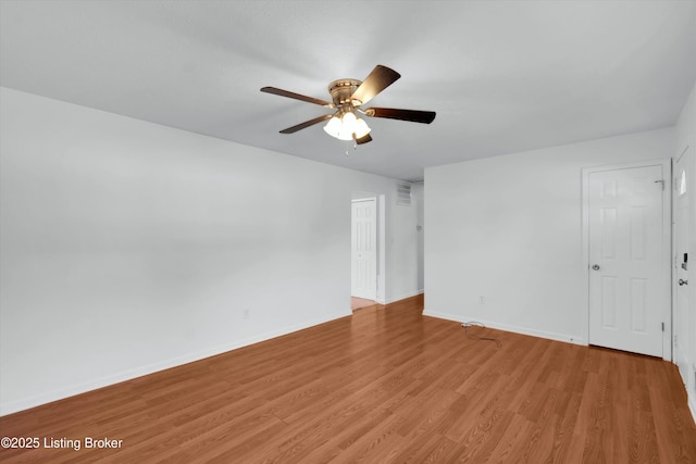 8313 Daverman Dr, Louisville, KY 40228 - empty room featuring ceiling fan and light wood-type flooring