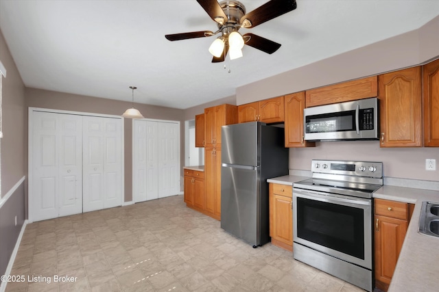 8313 Daverman Dr, Louisville, KY 40228 - kitchen featuring appliances with stainless steel finishes, light countertops, ceiling fan, and light floors