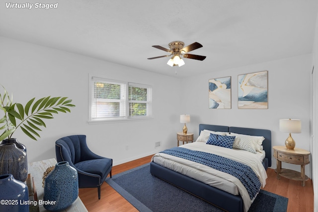 8313 Daverman Dr, Louisville, KY 40228 - bedroom with wood finished floors and a ceiling fan