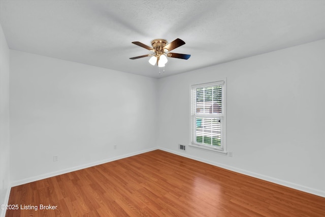 8313 Daverman Dr, Louisville, KY 40228 - unfurnished room featuring wood finished floors and ceiling fan