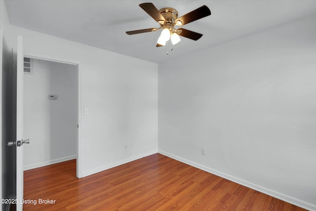 8313 Daverman Dr, Louisville, KY 40228 - empty room featuring wood finished floors and ceiling fan