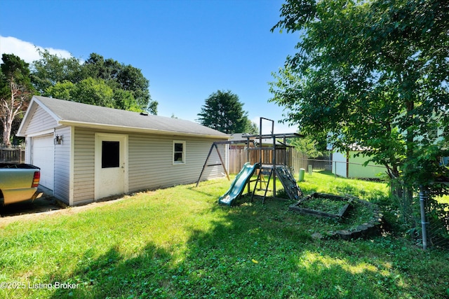 8313 Daverman Dr, Louisville, KY 40228 - view of yard with a playground, a detached garage, and an outdoor structure