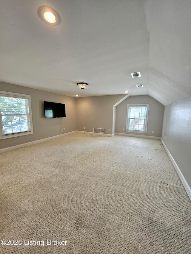 3919 Staebler Ave, Louisville, KY 40207 - carpeted empty room featuring lofted ceiling and baseboards