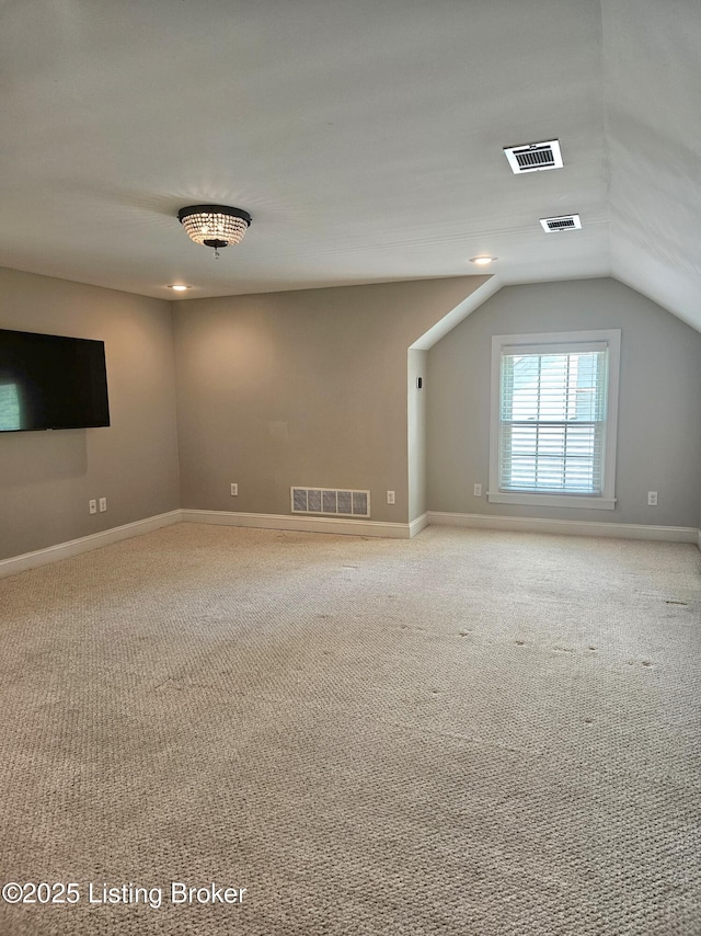 3919 Staebler Ave, Louisville, KY 40207 - spare room featuring lofted ceiling and light colored carpet