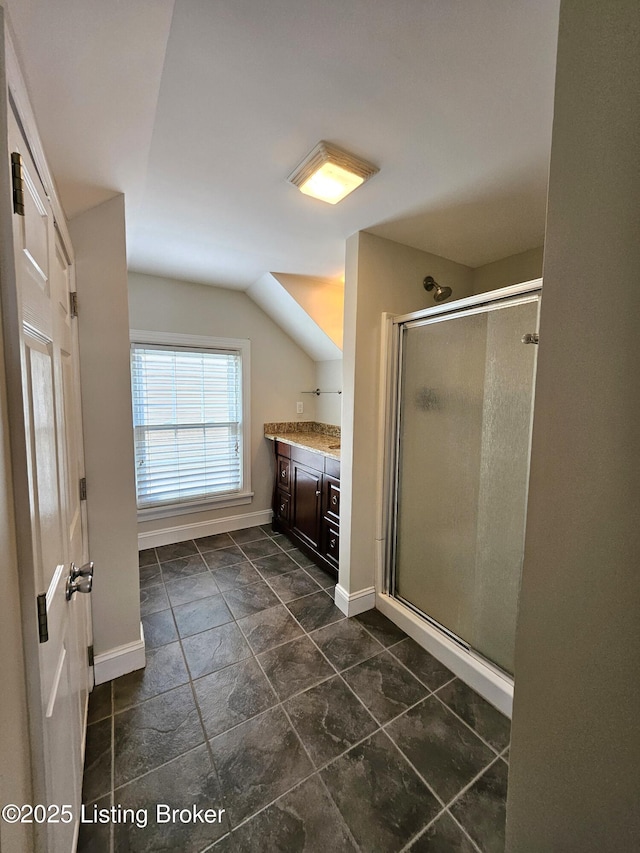 3919 Staebler Ave, Louisville, KY 40207 - bathroom with a shower stall, vanity, and lofted ceiling