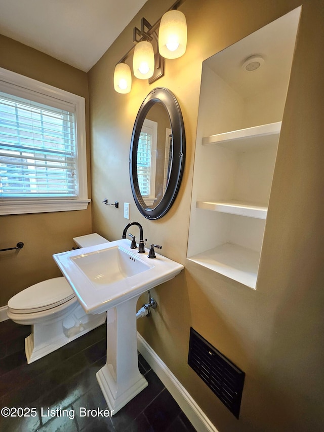 3919 Staebler Ave, Louisville, KY 40207 - bathroom featuring baseboards and toilet