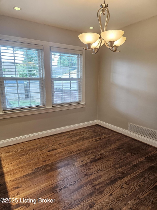 3919 Staebler Ave, Louisville, KY 40207 - spare room featuring a chandelier, dark wood finished floors, plenty of natural light, and recessed lighting