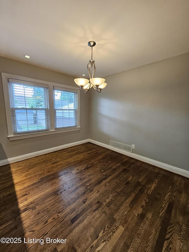 3919 Staebler Ave, Louisville, KY 40207 - unfurnished room with a chandelier, dark wood finished floors, and recessed lighting