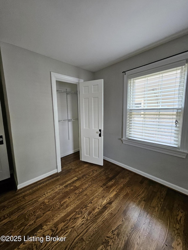 3919 Staebler Ave, Louisville, KY 40207 - unfurnished bedroom featuring dark wood-style floors and a closet
