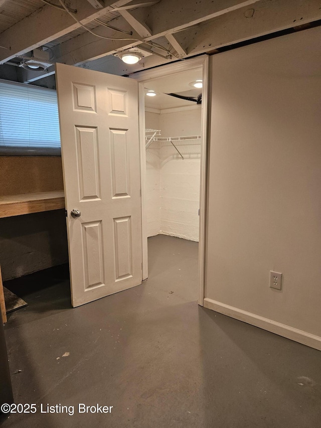 3919 Staebler Ave, Louisville, KY 40207 - unfurnished bedroom featuring concrete flooring, a closet, and a spacious closet