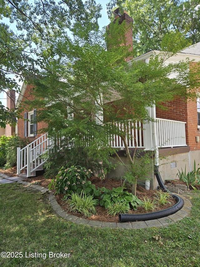 3919 Staebler Ave, Louisville, KY 40207 - view of property exterior featuring brick siding and a chimney