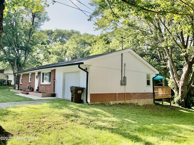 444 Lagrange Rd, New Castle, KY 40050 - view of side of home featuring a lawn, a garage, brick siding, and a deck