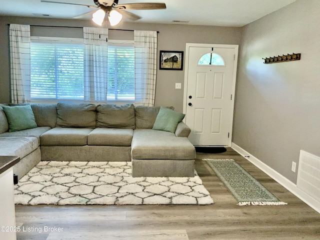 444 Lagrange Rd, New Castle, KY 40050 - living area featuring a ceiling fan, healthy amount of natural light, and wood finished floors