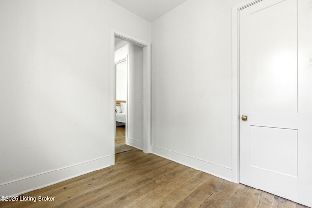 6115 Passionflower Dr, Prospect, KY 40059 - unfurnished bedroom featuring wood finished floors and baseboards