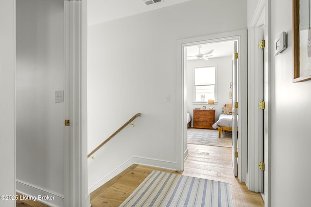 6115 Passionflower Dr, Prospect, KY 40059 - hall featuring an upstairs landing and light wood finished floors