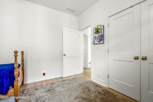 6115 Passionflower Dr, Prospect, KY 40059 - unfurnished bedroom with wood finished floors and a closet