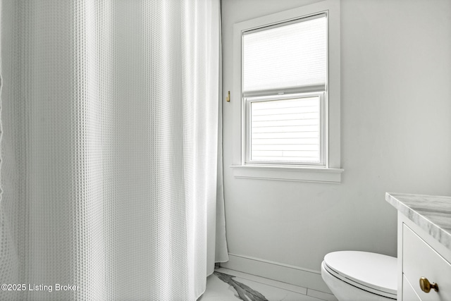 6115 Passionflower Dr, Prospect, KY 40059 - full bathroom featuring marble look tile flooring, vanity, and a shower with curtain