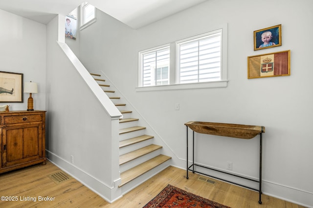 6115 Passionflower Dr, Prospect, KY 40059 - stairway featuring wood finished floors and plenty of natural light